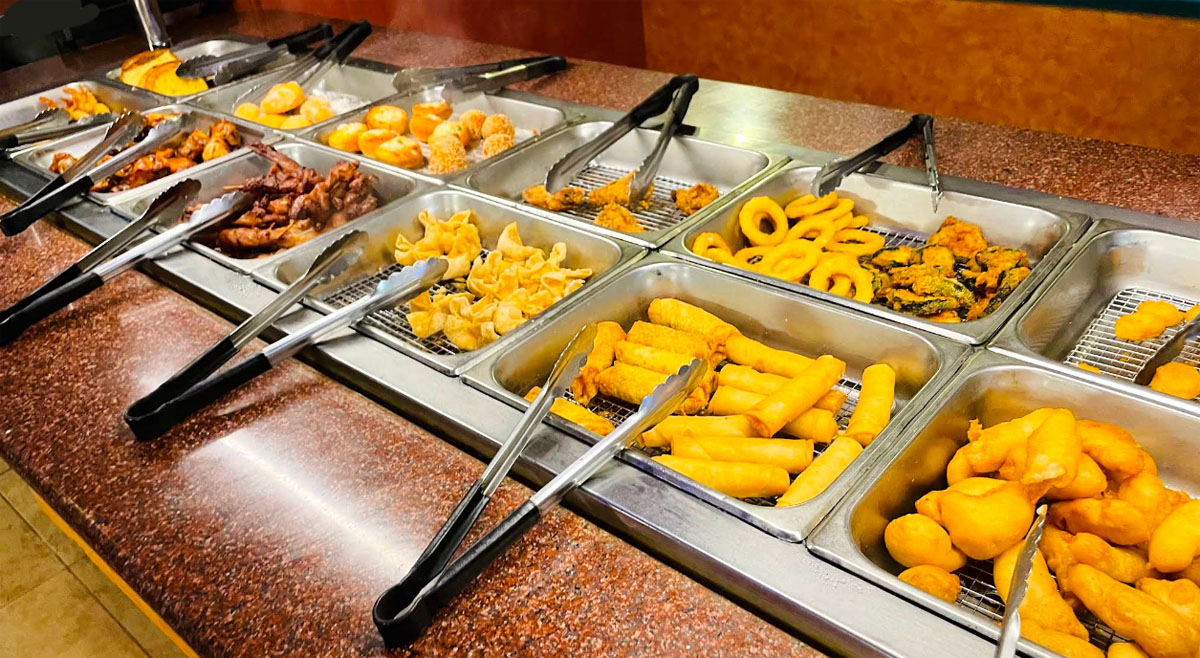 Fried appetizers including spring rolls and wontons